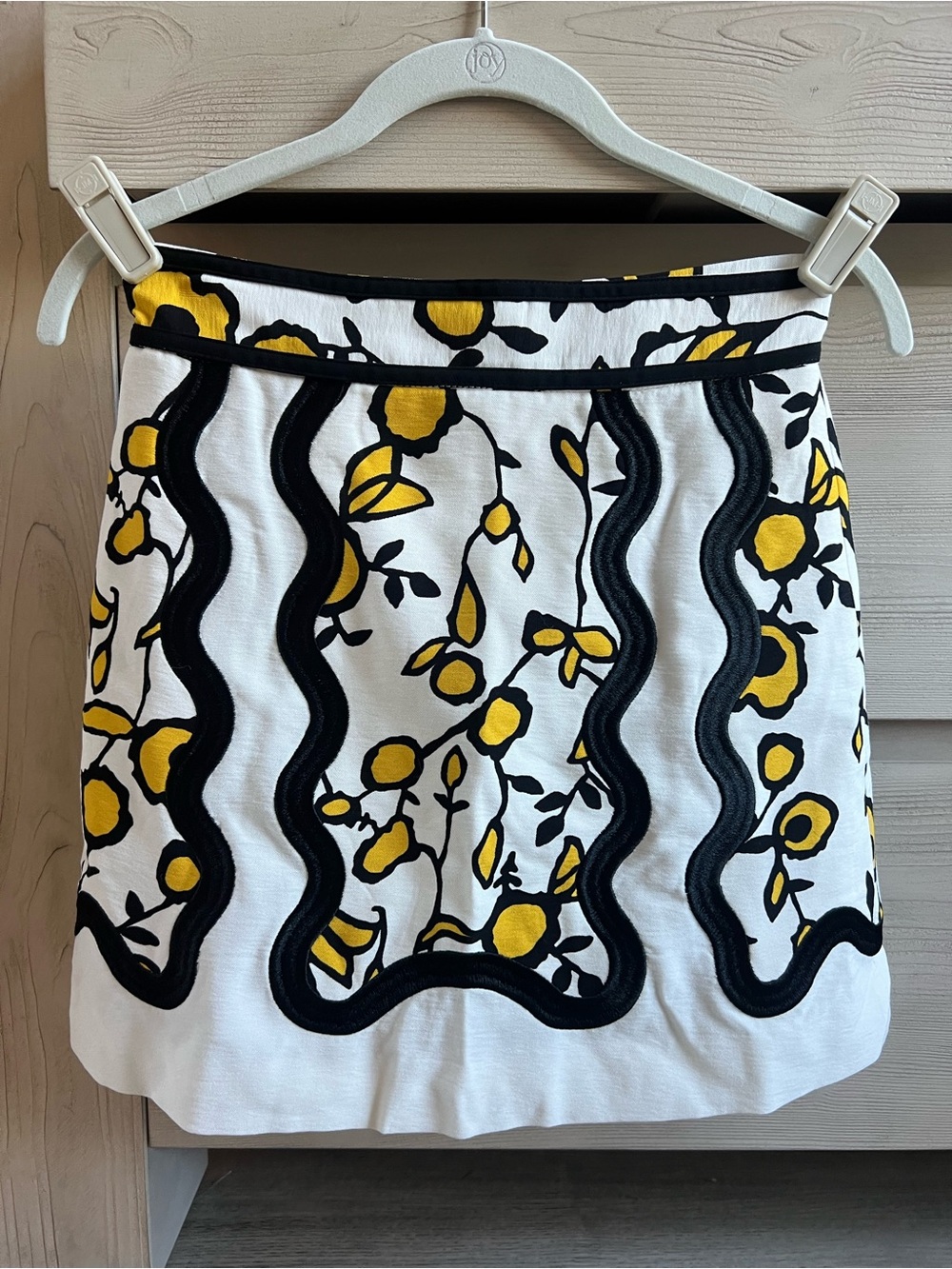 C/MEO Collective White Mini Skirt with Yellow & Black Floral Embroidery